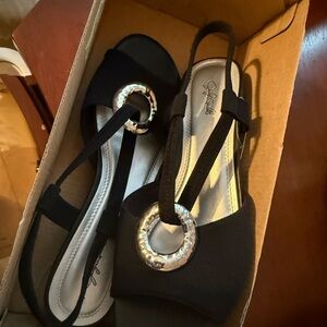 Elegant Black Sandals with Silver Accents by Jacquelyn Smith